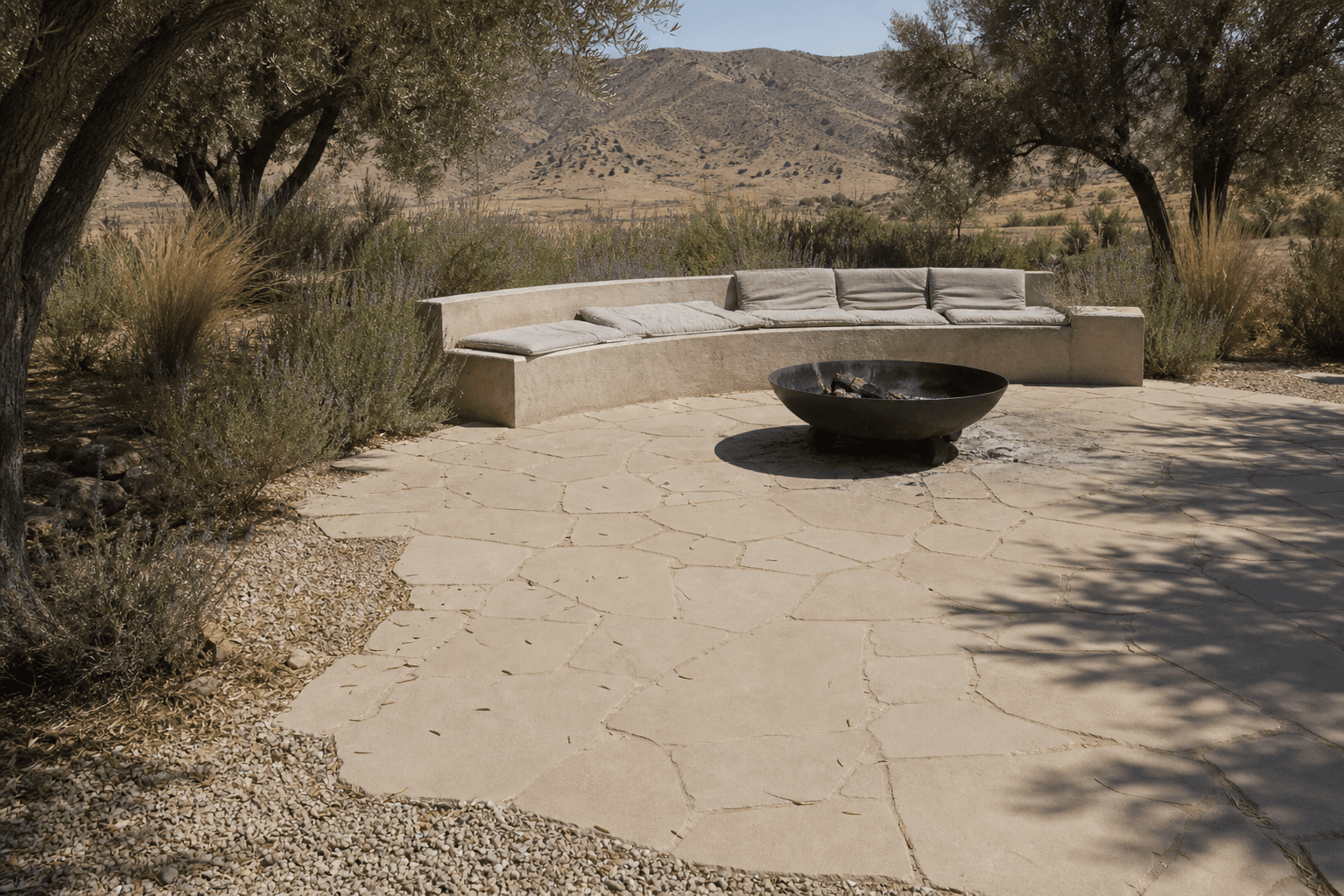 Chablis Beige crazy paving around a garden firepit