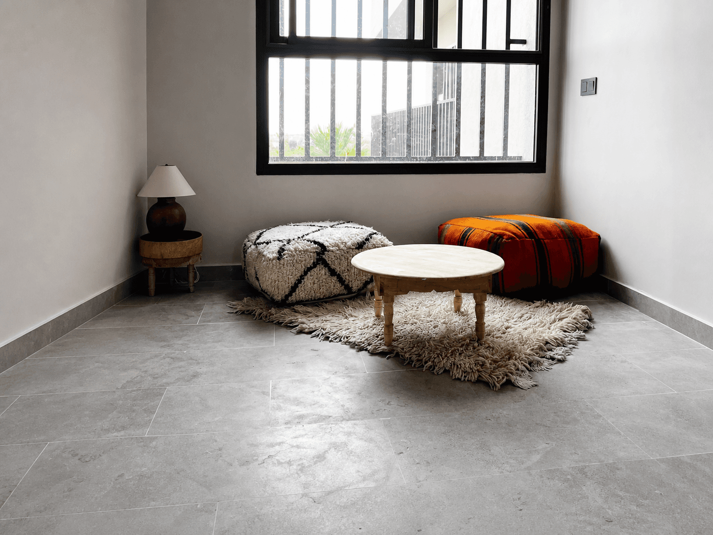 Avallon Grey floor in a light-filled sitting room