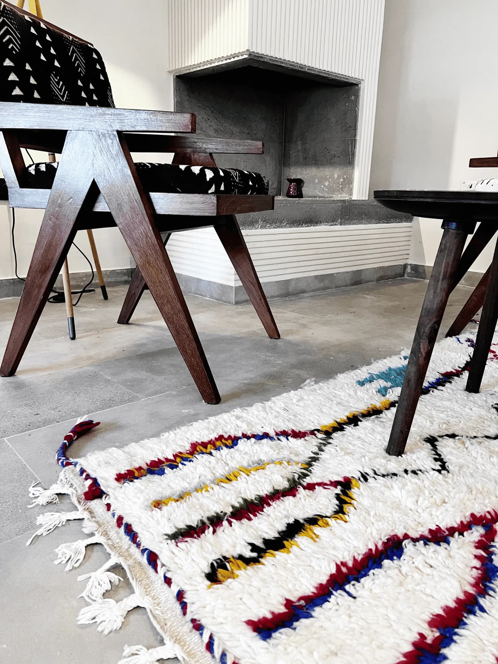 Avallon Grey limestone floor and fireplace surround in a Moroccan sitting room